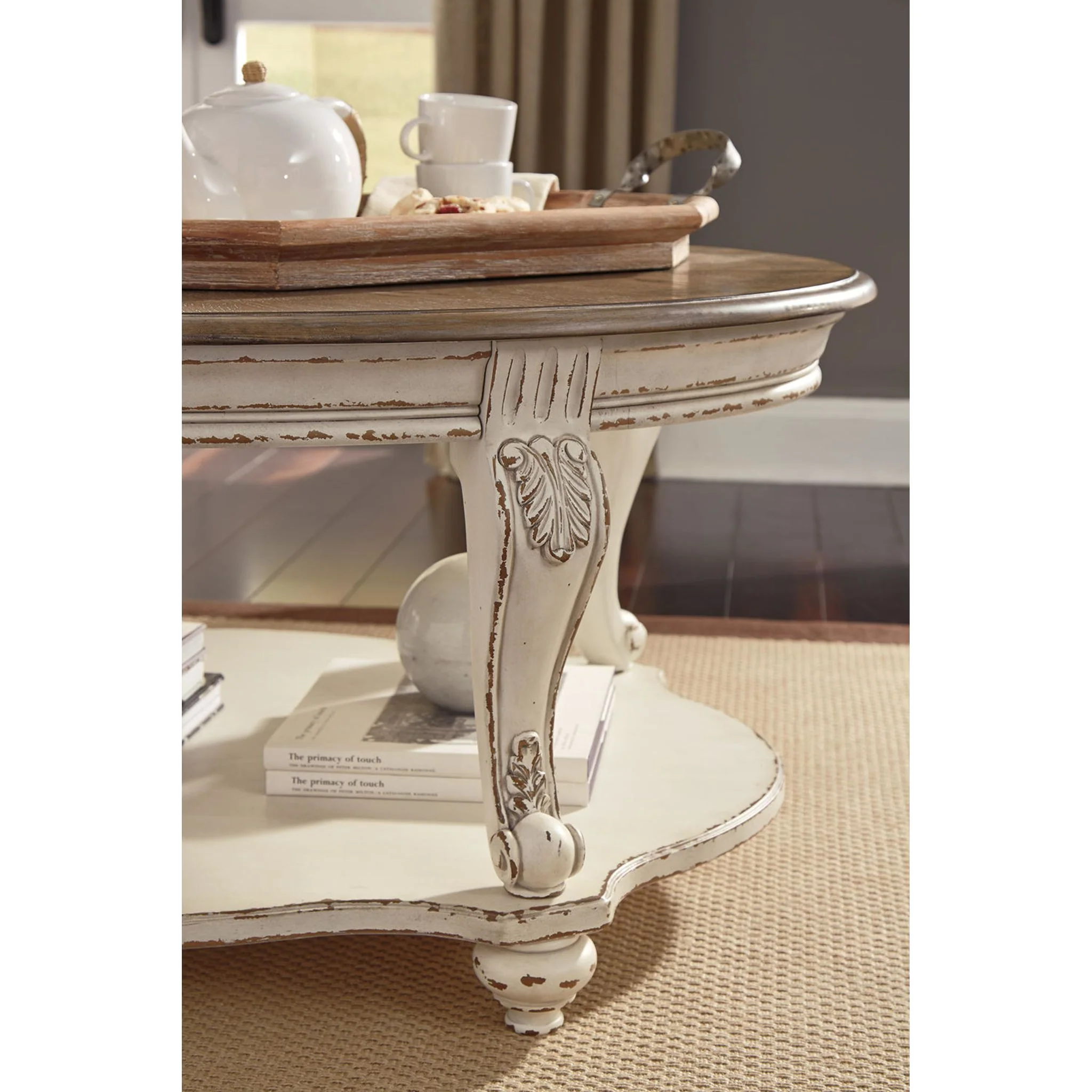 Realyn Oval Coffee Table - Image 12