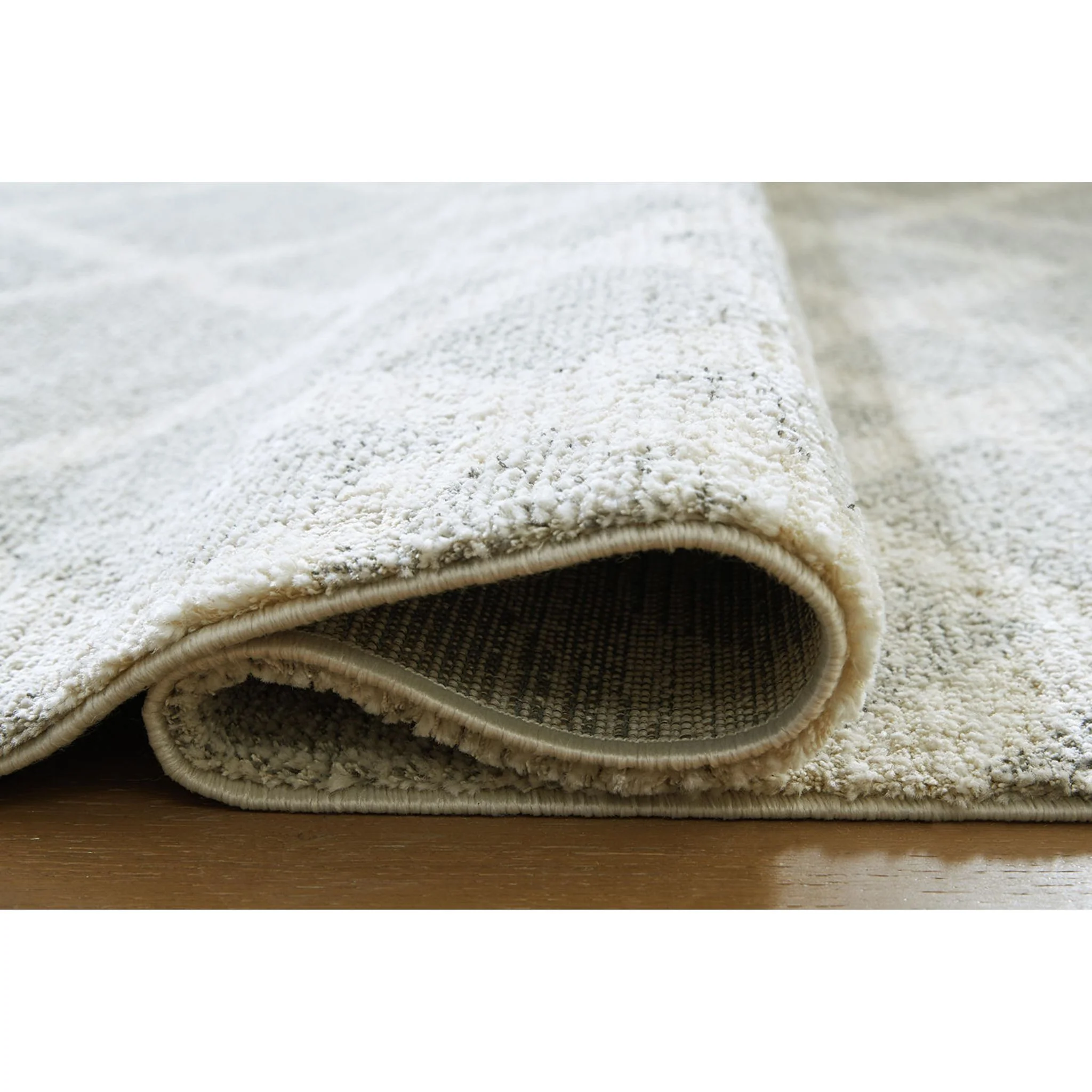 Unawick Area Rug - Image 5